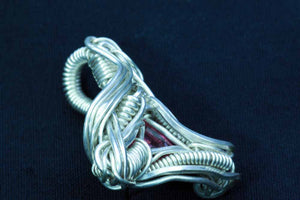 Pink tourmaline wire wrapped silver pendant side view